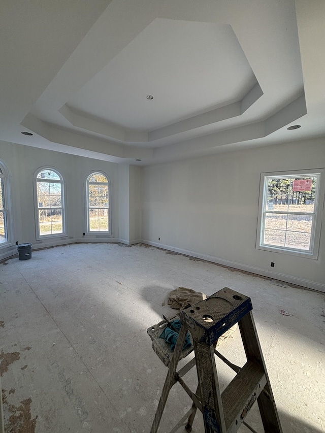 empty room with a tray ceiling