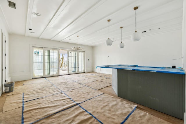 kitchen featuring light hardwood / wood-style flooring and pendant lighting