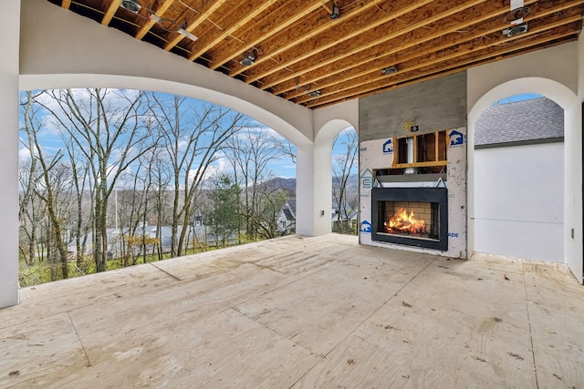 view of patio / terrace featuring an outdoor fireplace