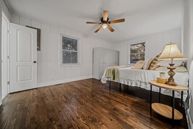 bedroom with hardwood / wood-style flooring and ceiling fan