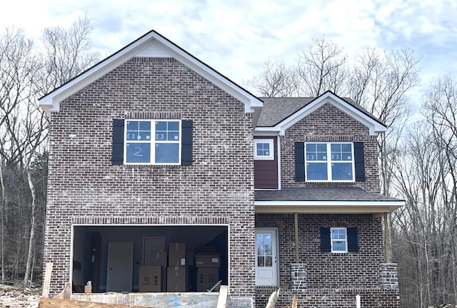 view of front of property featuring a garage