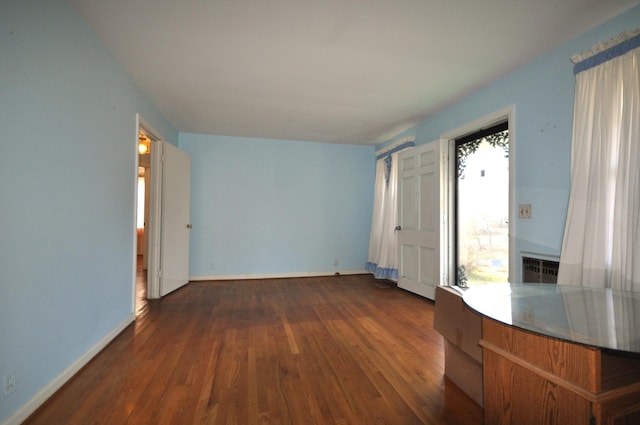 interior space with dark hardwood / wood-style flooring