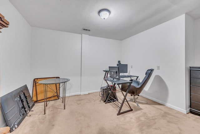 office with carpet flooring, visible vents, and baseboards