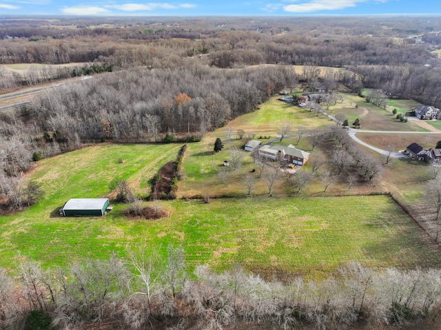 birds eye view of property featuring a rural view