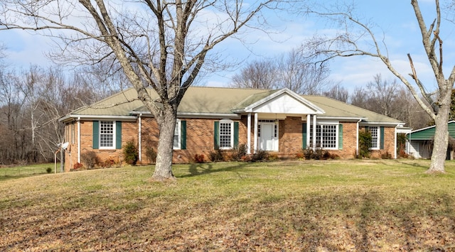 single story home with a front lawn