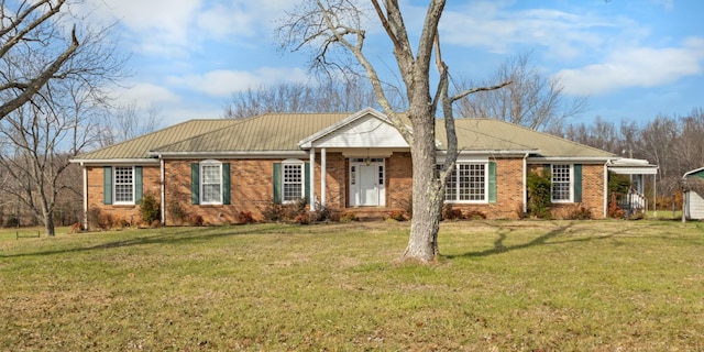 ranch-style house featuring a front lawn