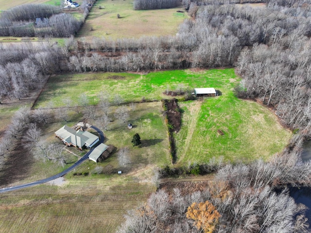 birds eye view of property featuring a rural view