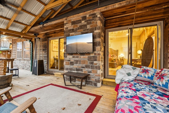 interior space featuring wood-type flooring, vaulted ceiling with beams, and wood ceiling