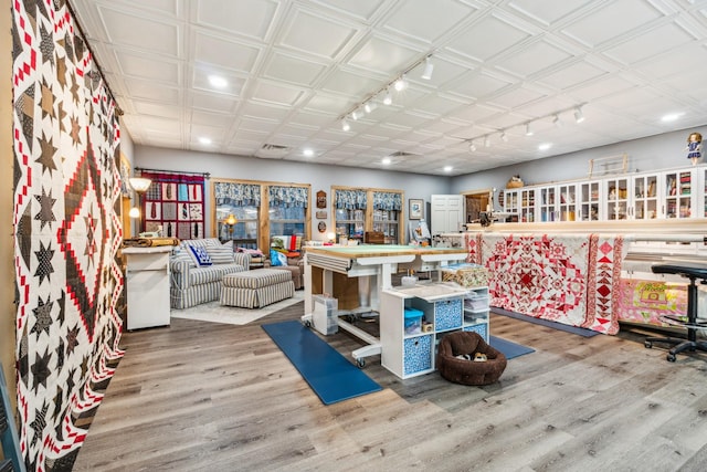 miscellaneous room featuring hardwood / wood-style flooring