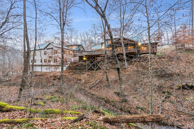 rear view of property with a deck