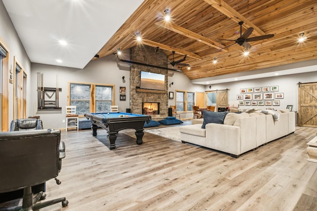 recreation room with wood ceiling, billiards, high vaulted ceiling, light hardwood / wood-style floors, and a barn door