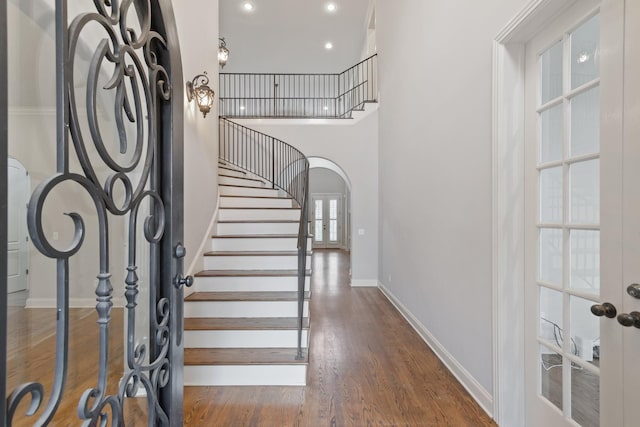 entrance foyer with dark hardwood / wood-style flooring