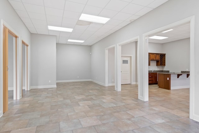 interior space featuring a paneled ceiling