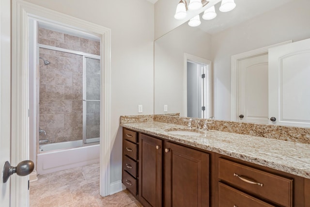 bathroom featuring vanity and enclosed tub / shower combo