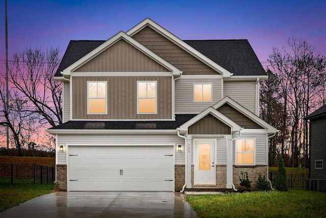 craftsman inspired home with a garage