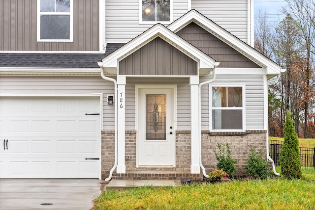 property entrance with a garage