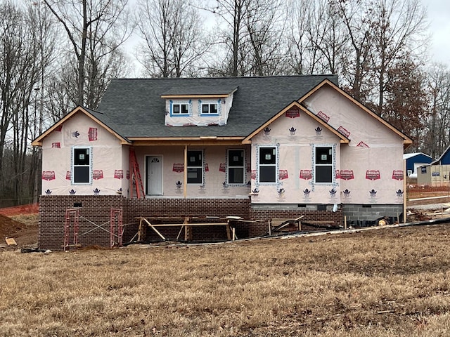 property in mid-construction with a front lawn and a porch