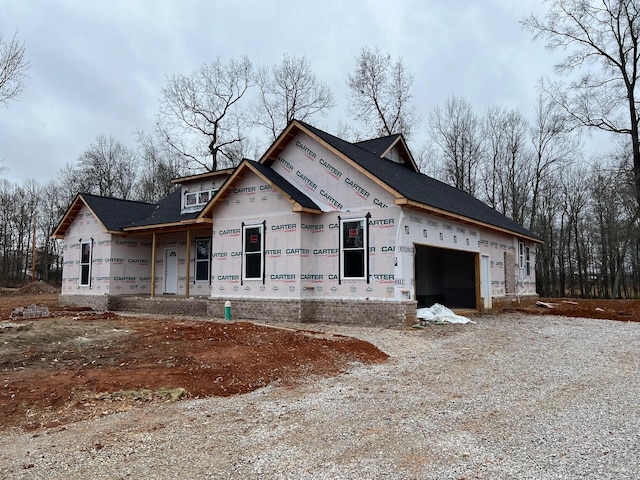 property under construction featuring a garage