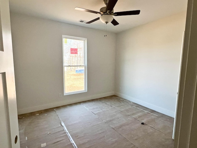 empty room with plenty of natural light, visible vents, baseboards, and ceiling fan