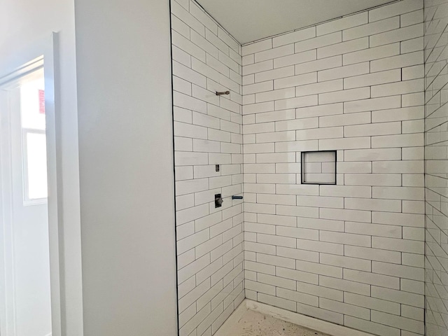 bathroom with a shower stall