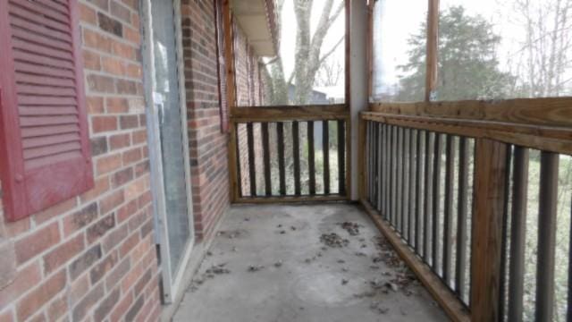 146 Garden Dr, Lafayette, TN 37083 - view of unfurnished sunroom