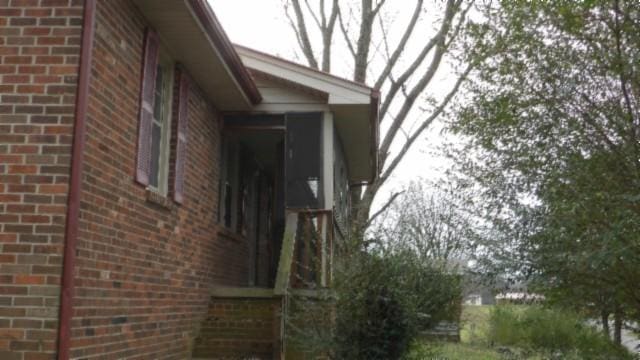 146 Garden Dr, Lafayette, TN 37083 - view of property exterior with brick siding