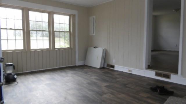 146 Garden Dr, Lafayette, TN 37083 - spare room featuring wood finished floors and baseboards