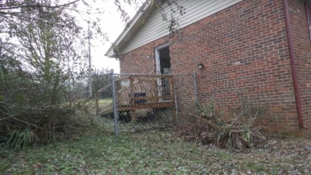 146 Garden Dr, Lafayette, TN 37083 - view of home's exterior featuring brick siding