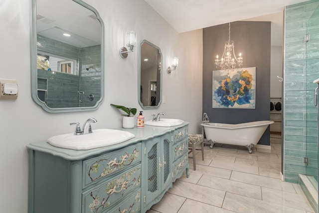 bathroom featuring tile patterned flooring, a notable chandelier, vanity, and independent shower and bath