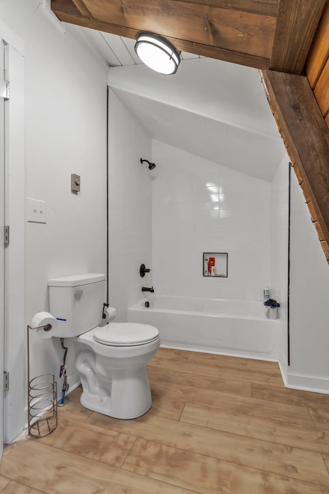 bathroom with toilet and hardwood / wood-style flooring