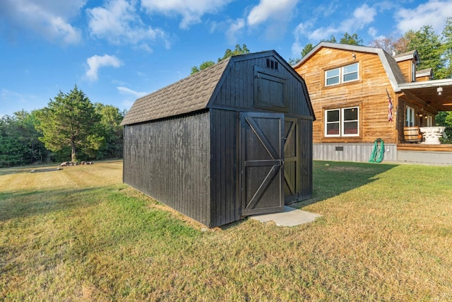 view of outdoor structure with a yard