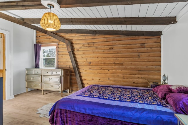 bedroom featuring lofted ceiling with beams, light hardwood / wood-style floors, rustic walls, and wood ceiling