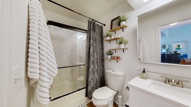 full bathroom with shower / bath combo, vanity, and toilet