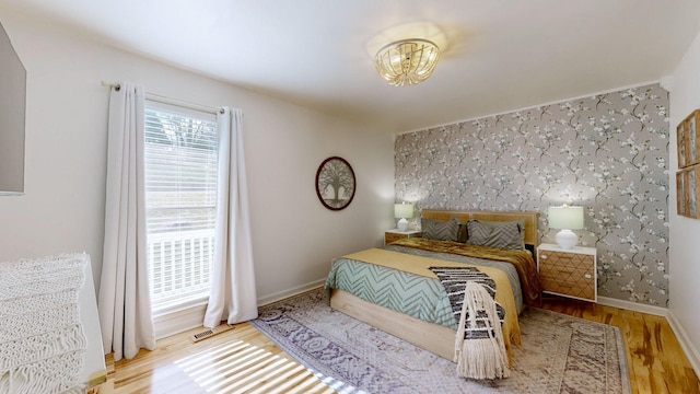 bedroom featuring light hardwood / wood-style floors