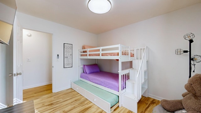 bedroom featuring hardwood / wood-style floors