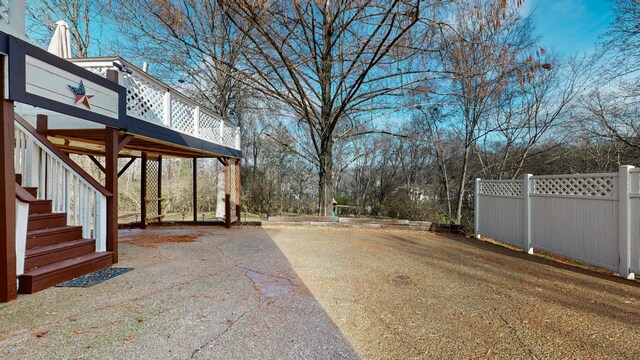 view of yard featuring a deck