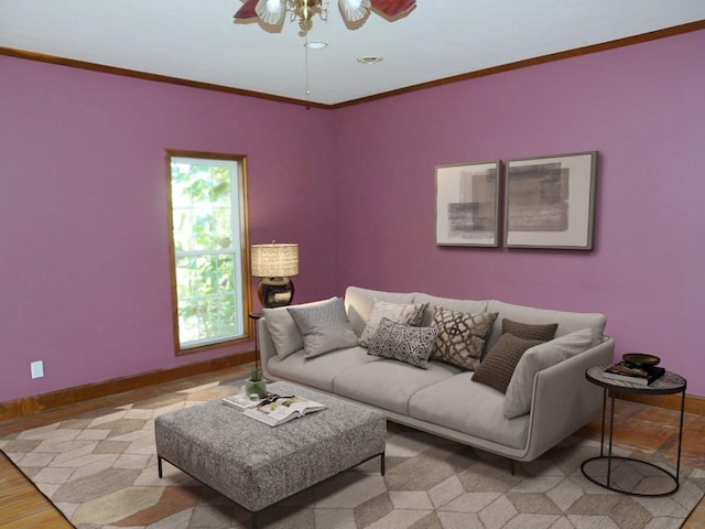 living room with crown molding, ceiling fan, and light wood-type flooring