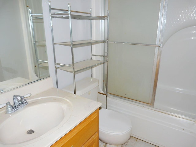 full bathroom with vanity, toilet, and enclosed tub / shower combo