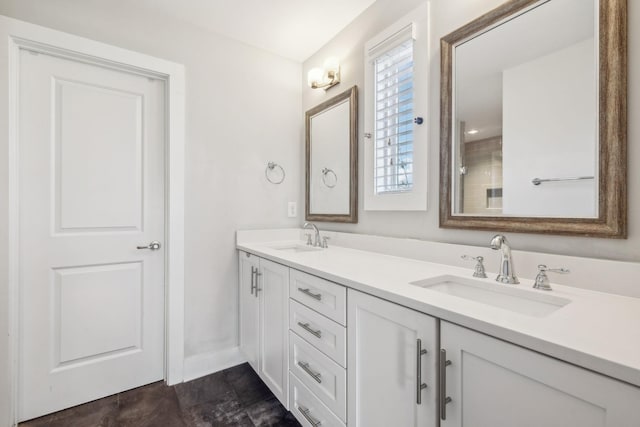 full bathroom featuring a sink and double vanity