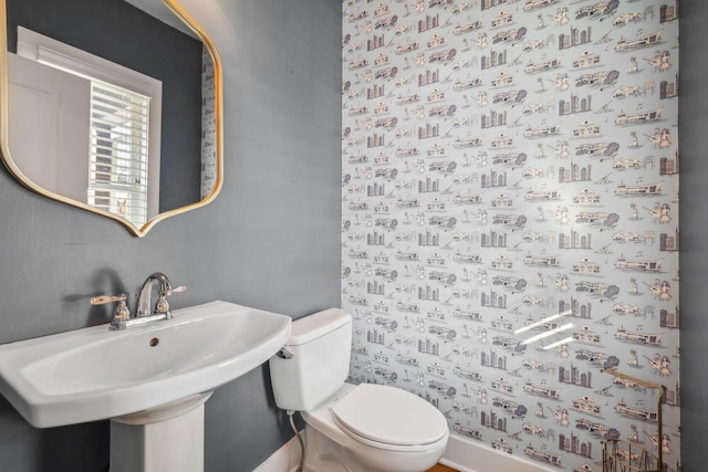 bathroom with a sink and toilet