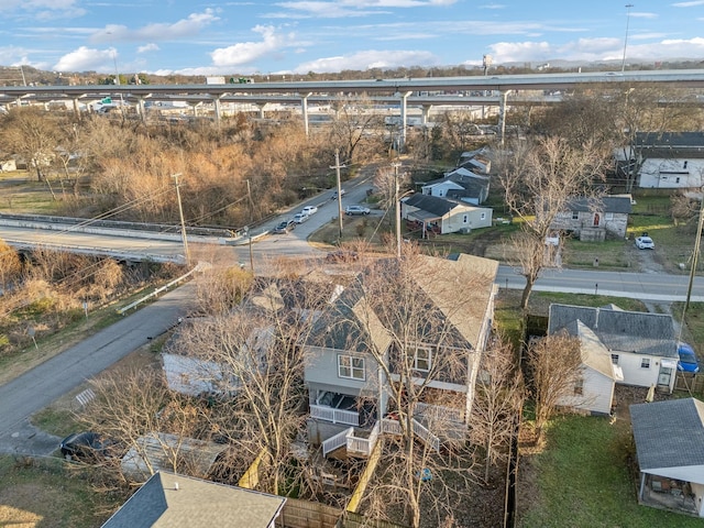 birds eye view of property with a residential view