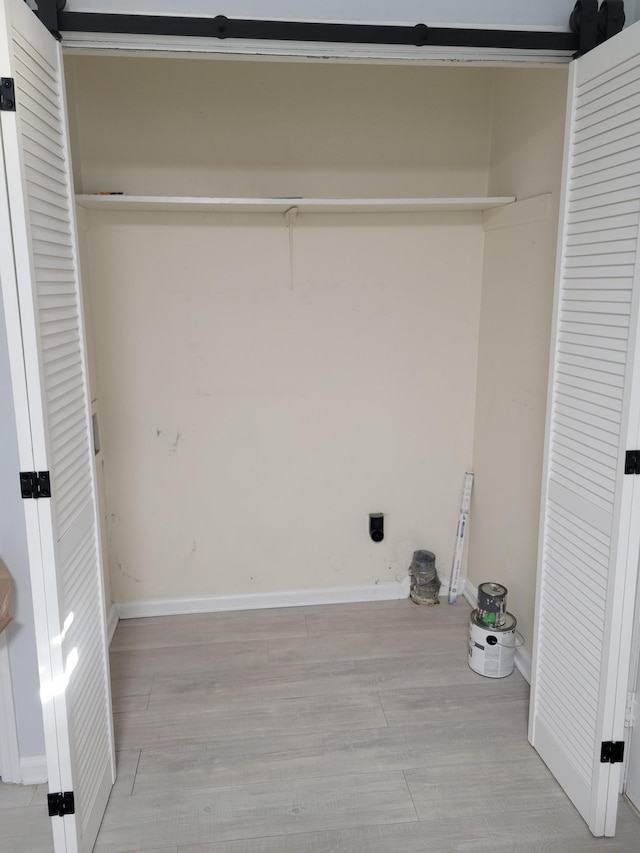 washroom featuring light hardwood / wood-style floors