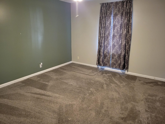 spare room with carpet