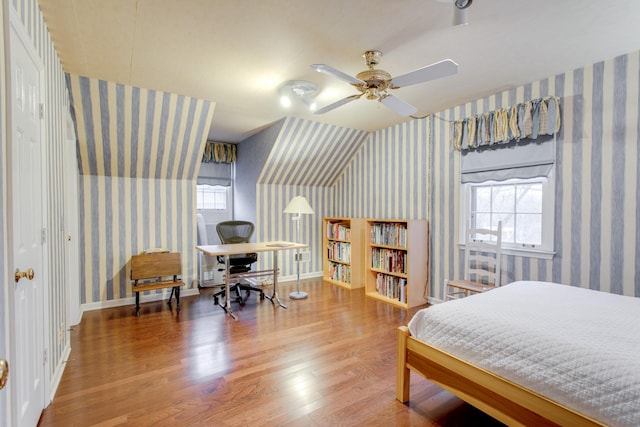 bedroom featuring a closet, ceiling fan, and hardwood / wood-style floors