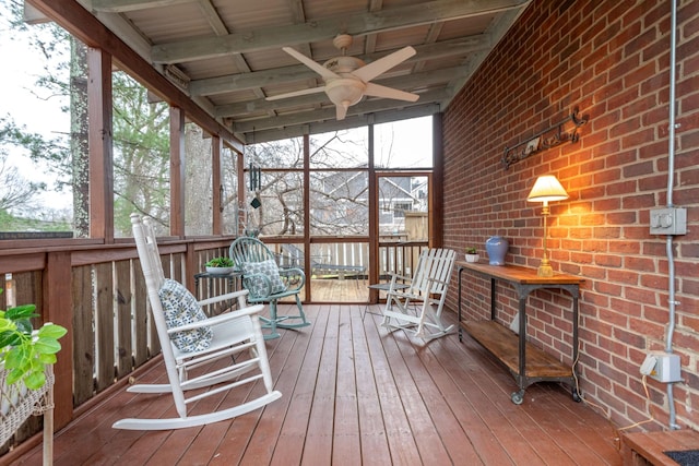 sunroom featuring wooden ceiling