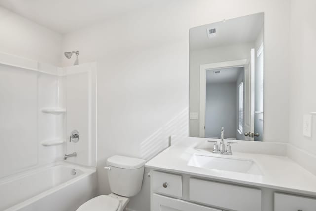 bathroom with visible vents,  shower combination, vanity, and toilet