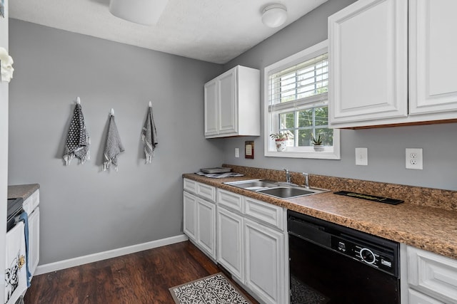 kitchen featuring sink, black dishwasher, dark hardwood / wood-style flooring, stove, and white cabinets