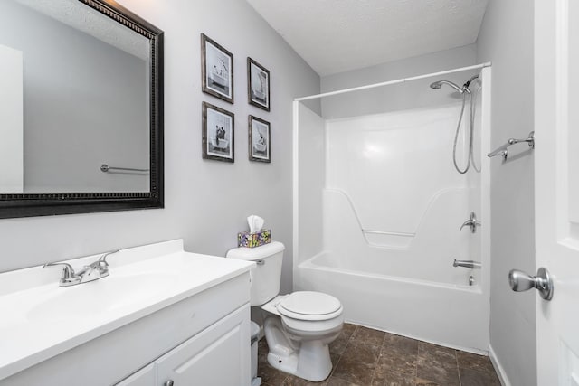 full bathroom featuring vanity, a textured ceiling, toilet, and  shower combination