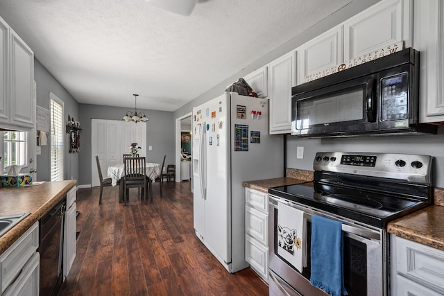 kitchen with black appliances, dark hardwood / wood-style floors, a textured ceiling, white cabinetry, and a chandelier