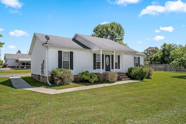 single story home with a front lawn